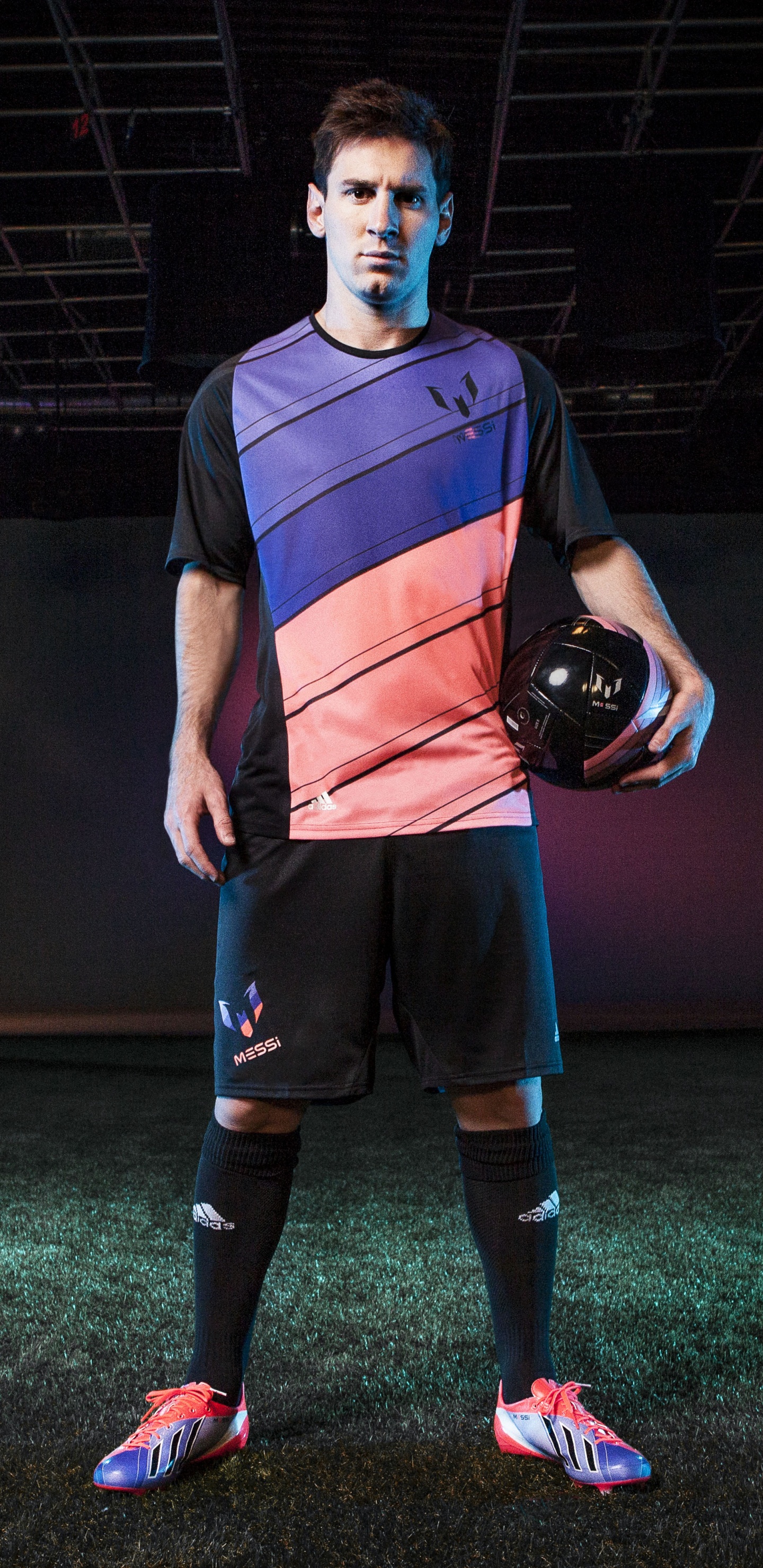 Man in Blue and Black Crew Neck T-shirt and Brown Shorts Holding Black Basketball. Wallpaper in 1440x2960 Resolution