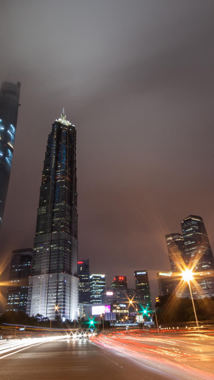 City Buildings During Night Time. Wallpaper in 750x1334 Resolution