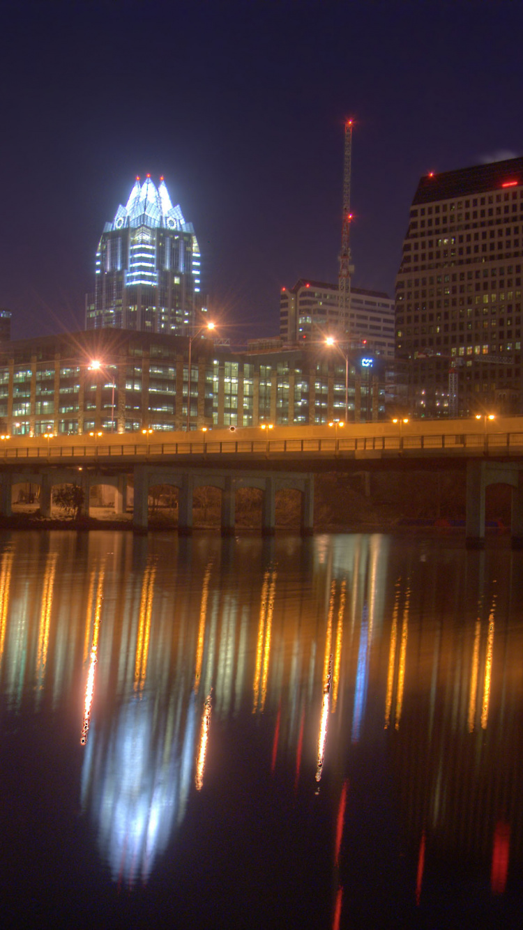 City Skyline During Night Time. Wallpaper in 750x1334 Resolution