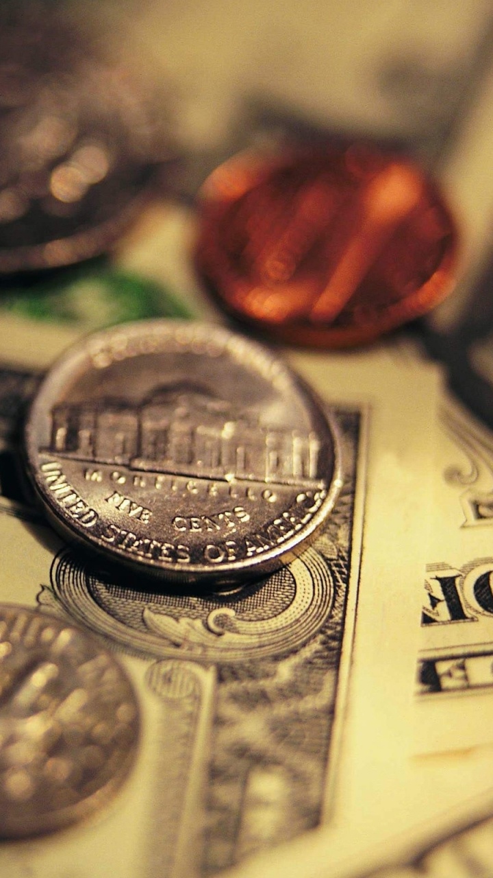 Monedas Redondas de Plata Sobre Papel de Impresora Blanco. Wallpaper in 720x1280 Resolution