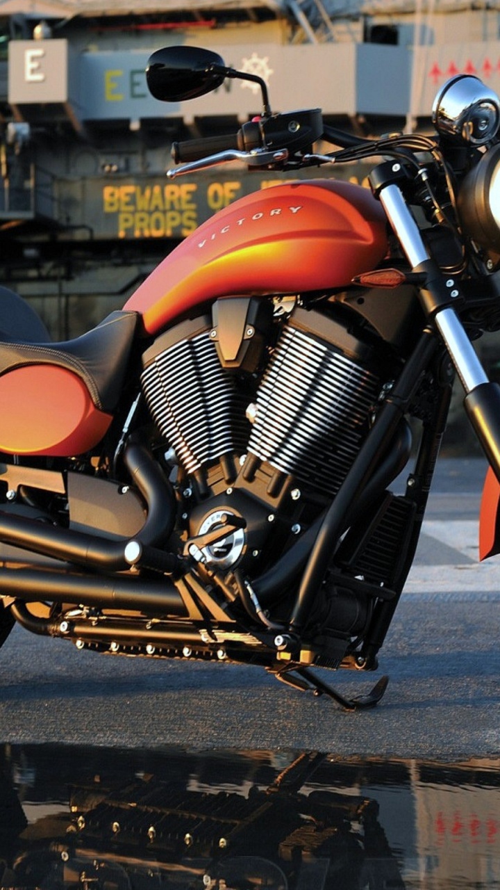 Orange and Black Cruiser Motorcycle. Wallpaper in 720x1280 Resolution