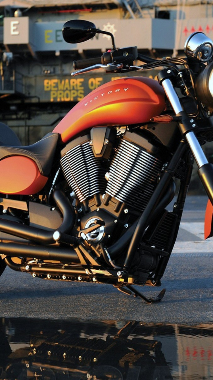 Orange and Black Cruiser Motorcycle. Wallpaper in 750x1334 Resolution