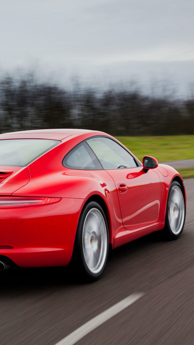 Porsche 911 Rouge Sur Route Pendant la Journée. Wallpaper in 750x1334 Resolution