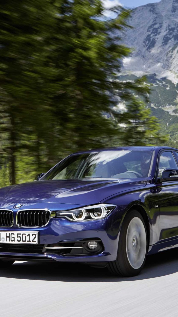 Blue Audi a 4 on Road During Daytime. Wallpaper in 720x1280 Resolution