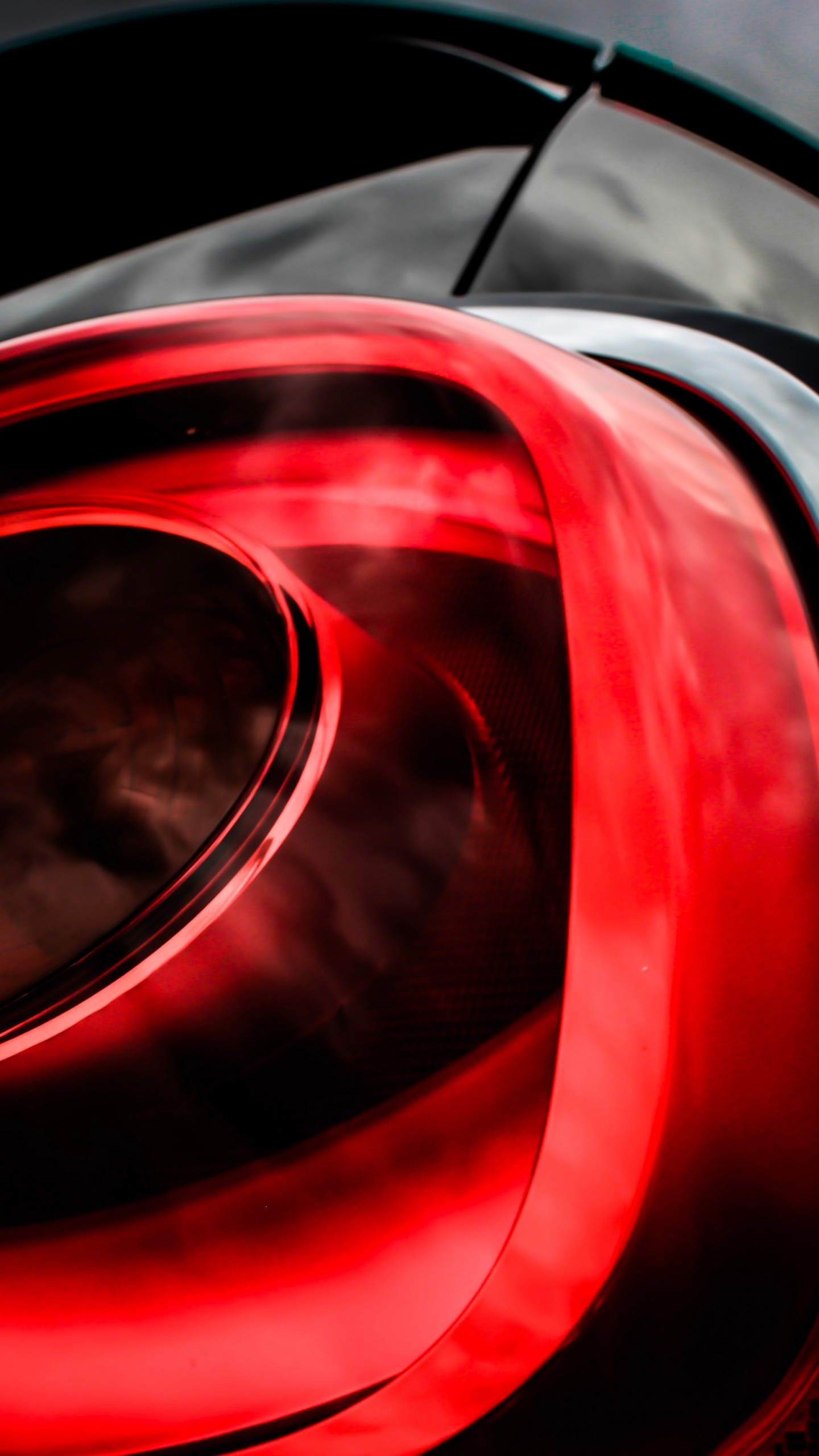 Red and Black Car Side Mirror. Wallpaper in 1440x2560 Resolution