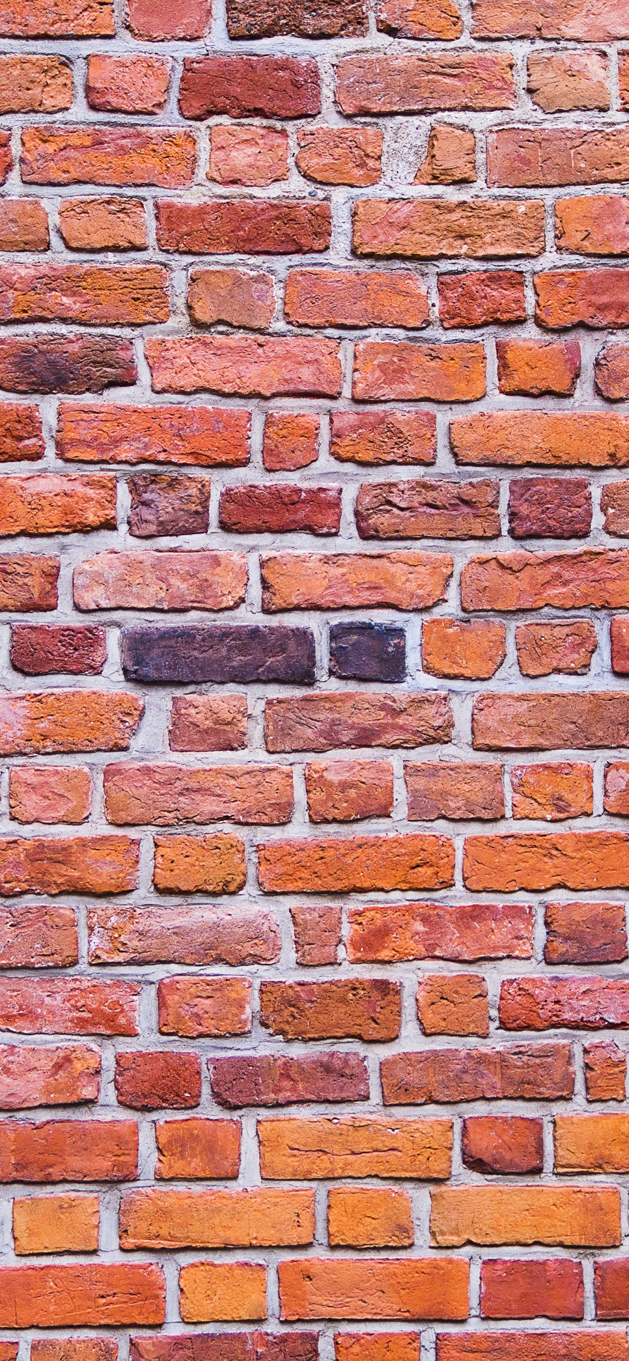 Brown and Black Brick Wall. Wallpaper in 1242x2688 Resolution