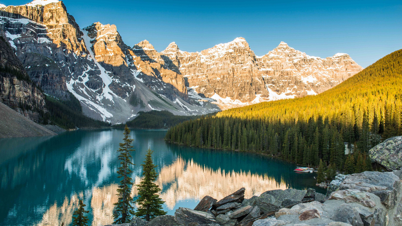 Green Trees Near Lake and Snow Covered Mountain During Daytime. Wallpaper in 1366x768 Resolution