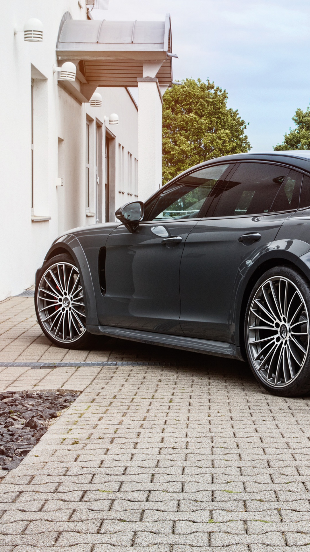 Black Porsche 911 Parked Near White Building During Daytime. Wallpaper in 1080x1920 Resolution