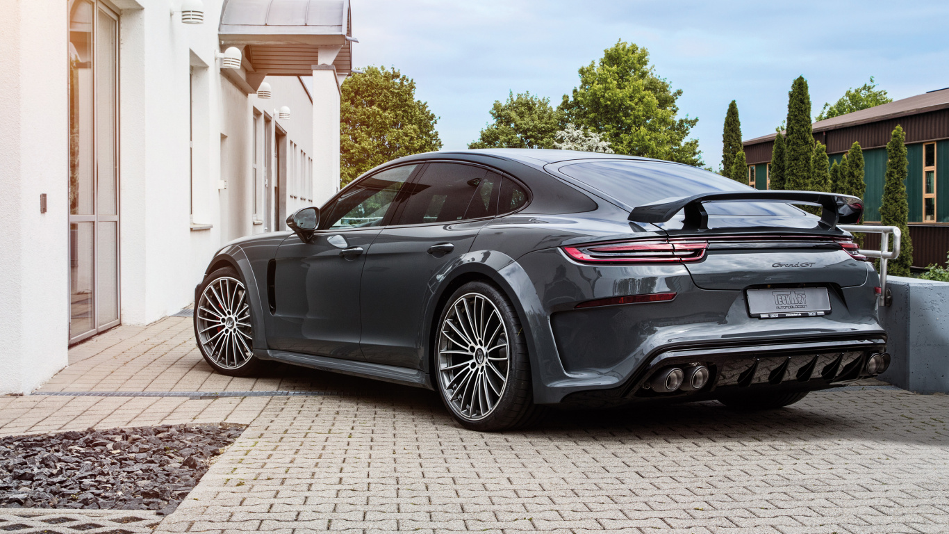 Black Porsche 911 Parked Near White Building During Daytime. Wallpaper in 1366x768 Resolution
