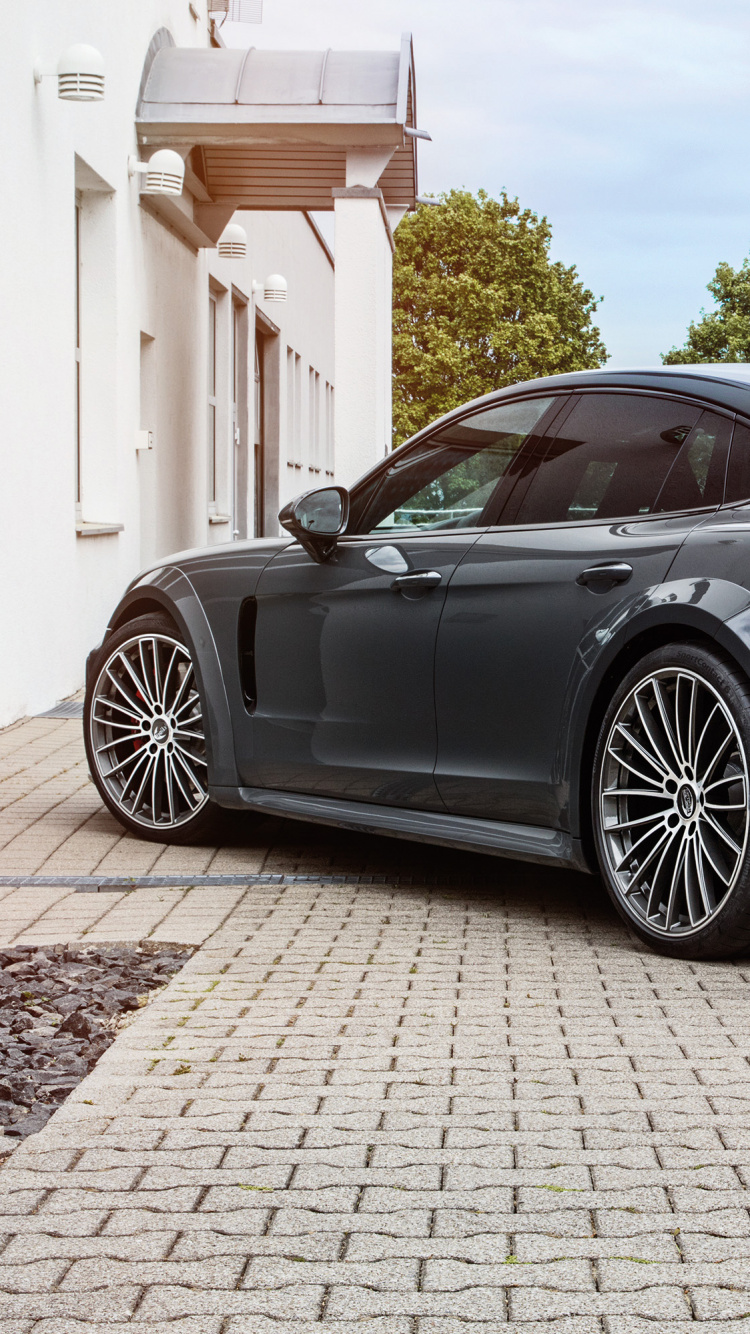 Porsche 911 Noire Garée Près D'un Bâtiment Blanc Pendant la Journée. Wallpaper in 750x1334 Resolution