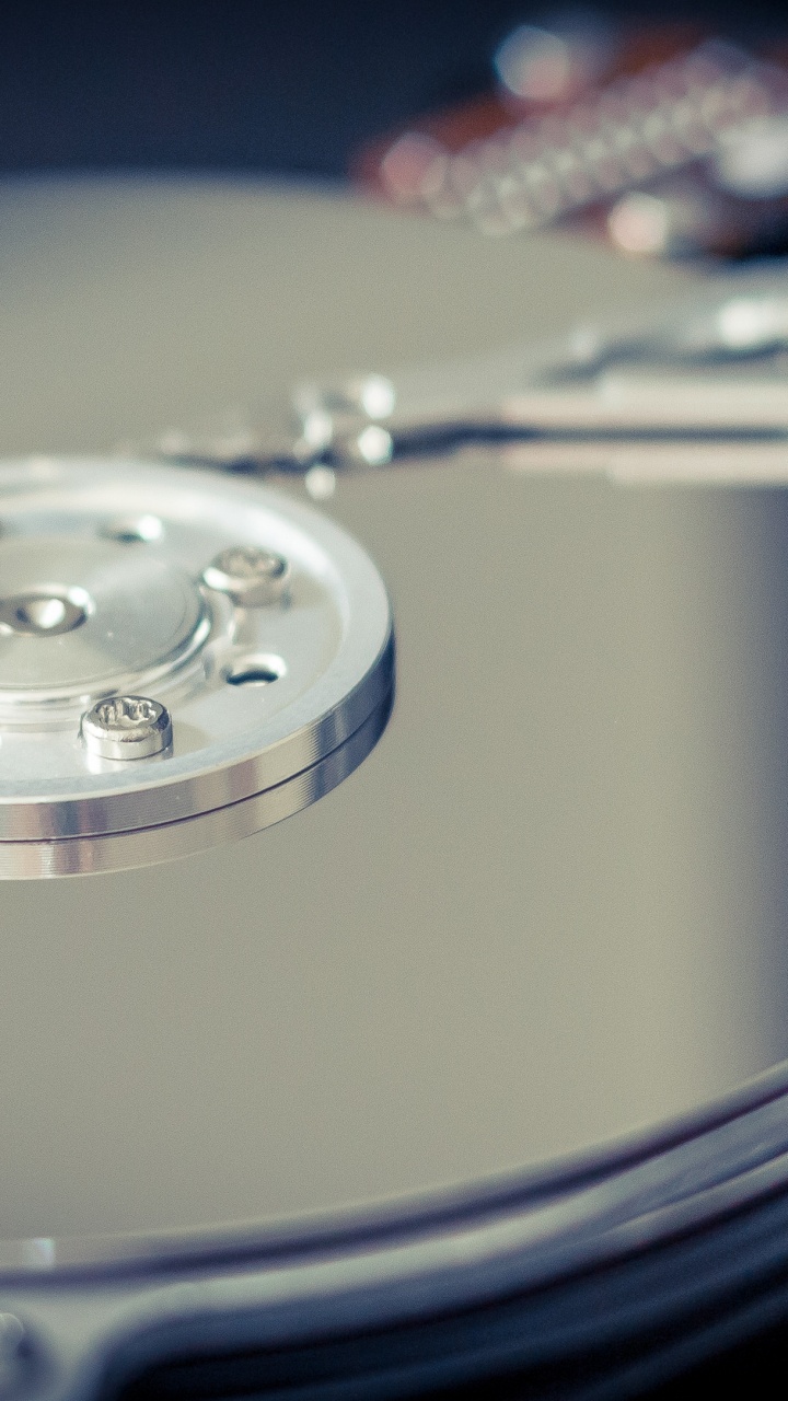 Silver Vinyl Record Player With Vinyl Record. Wallpaper in 720x1280 Resolution