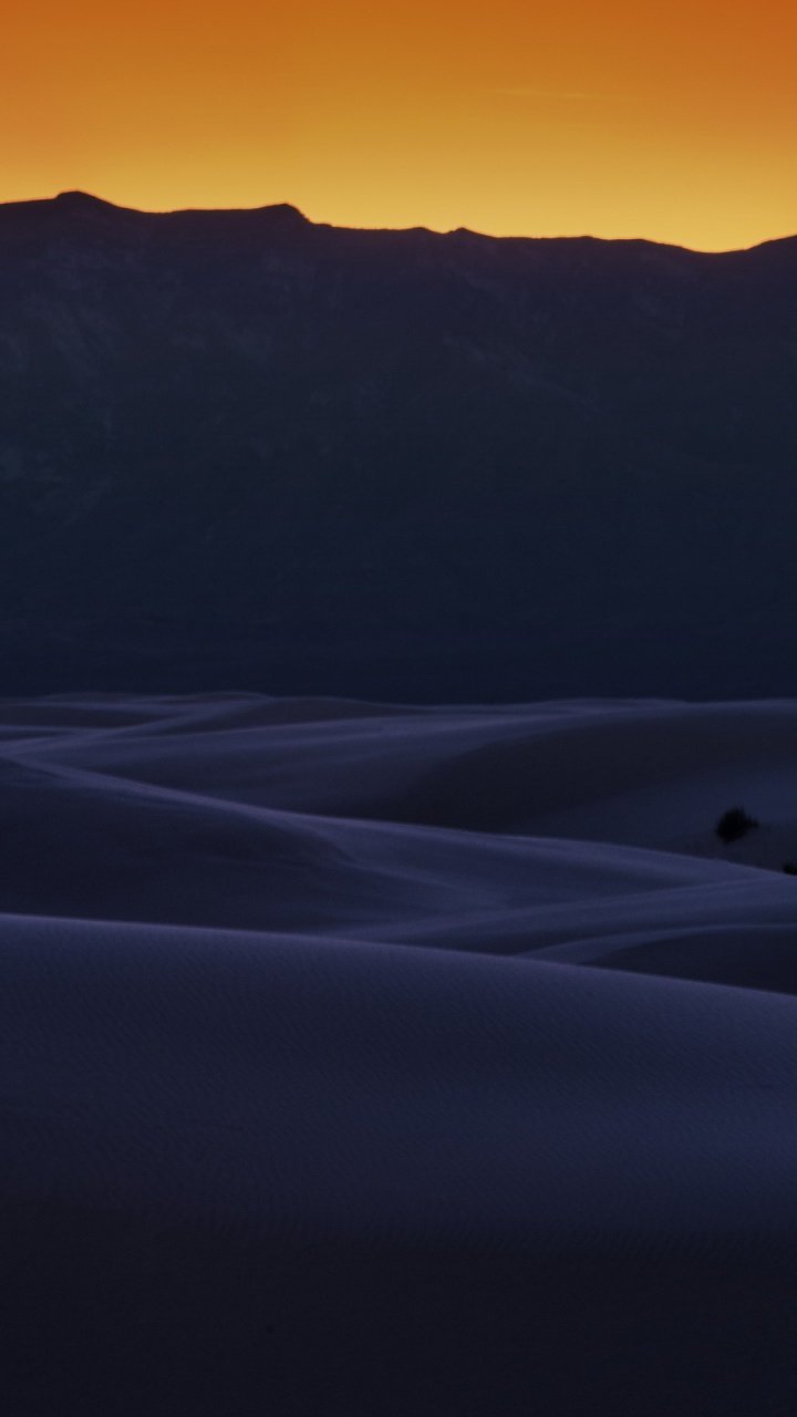 Snow Covered Mountain During Sunset. Wallpaper in 720x1280 Resolution