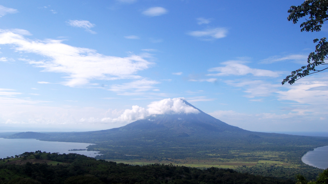 Green Mountain Under Blue Sky and White Clouds During Daytime. Wallpaper in 1366x768 Resolution