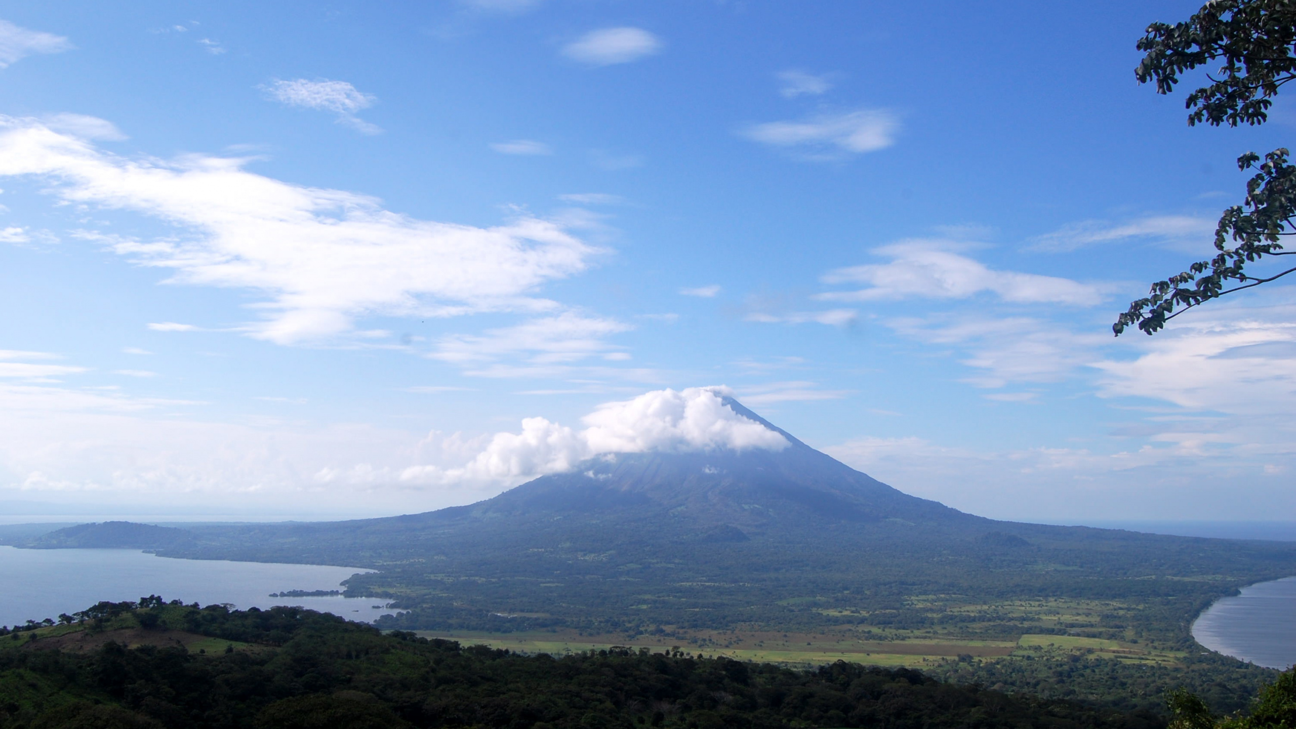 Green Mountain Under Blue Sky and White Clouds During Daytime. Wallpaper in 2560x1440 Resolution
