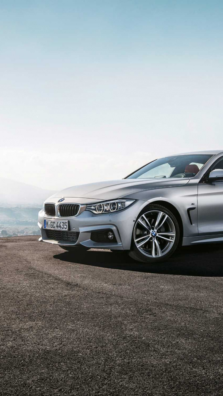 Silver Bmw m 3 on Brown Sand During Daytime. Wallpaper in 750x1334 Resolution