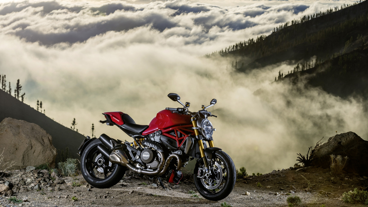 Red and Black Sports Bike on Brown Field Under White Clouds During Daytime. Wallpaper in 1280x720 Resolution