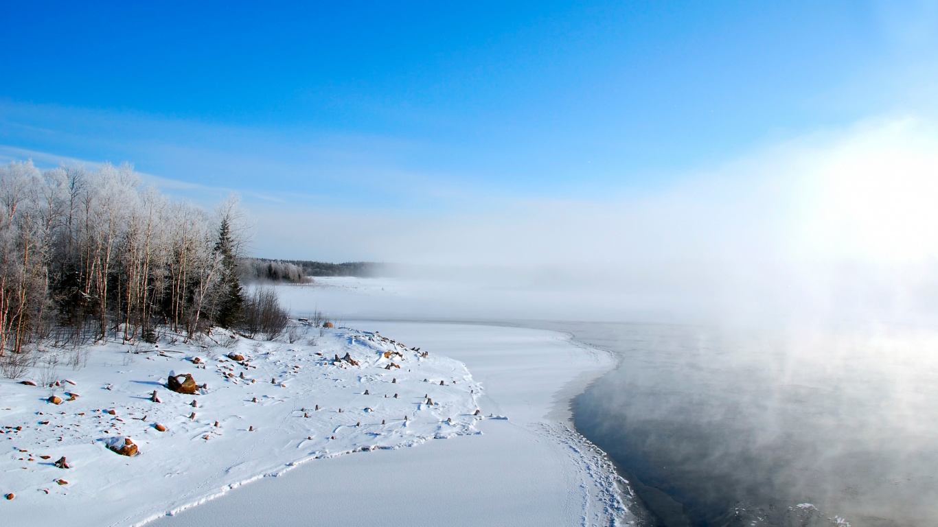 Snow Covered Field Under Blue Sky During Daytime. Wallpaper in 1366x768 Resolution
