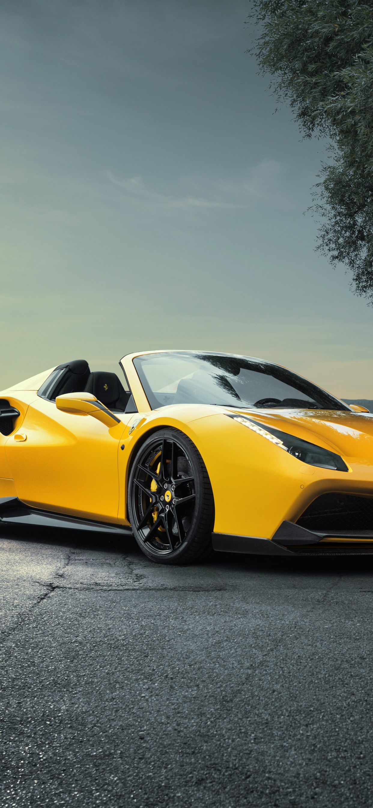Yellow Ferrari 458 Italia on Road. Wallpaper in 1242x2688 Resolution