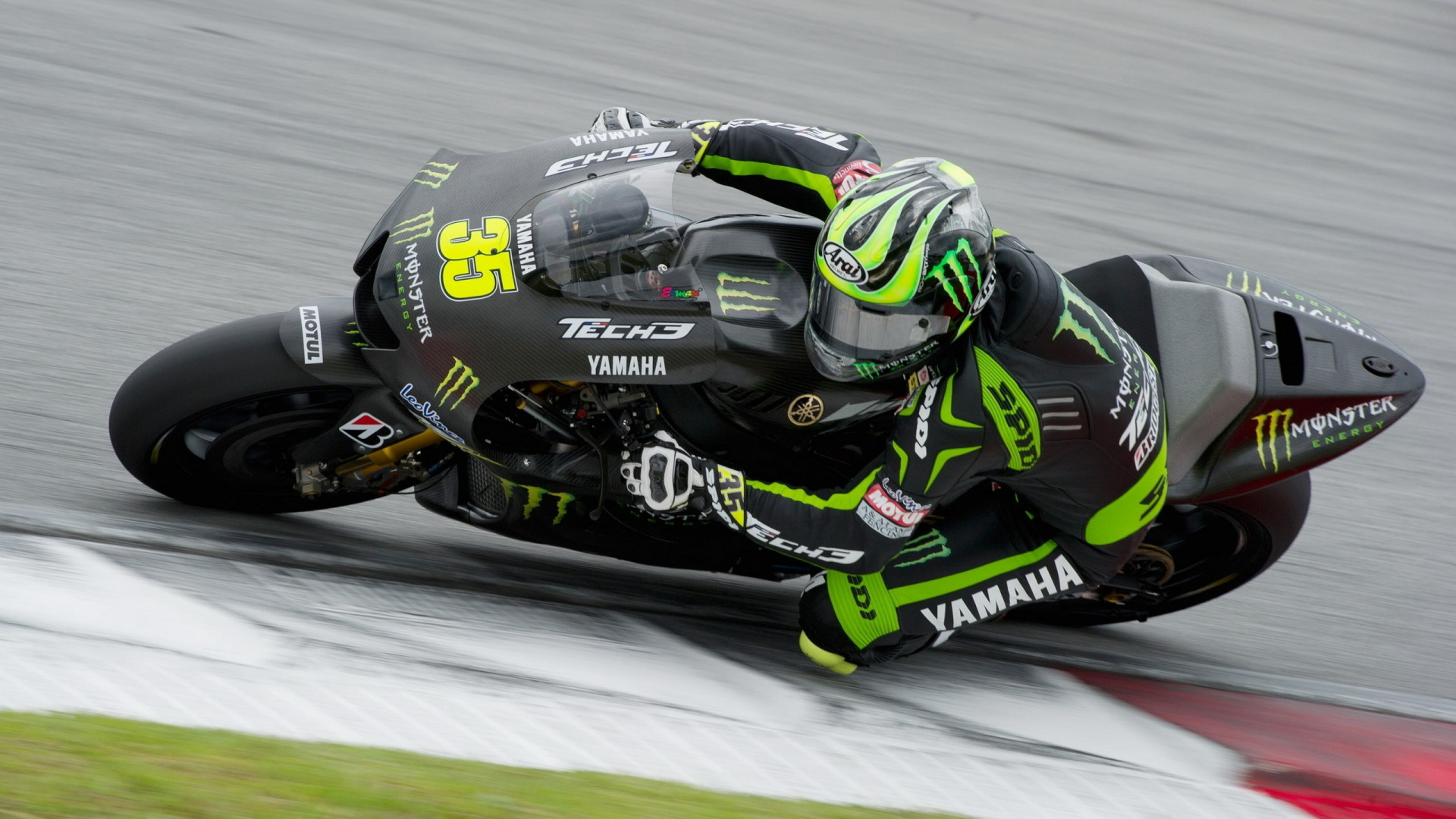 Man in Green and Black Motorcycle Suit Riding on Black and Yellow Sports Bike. Wallpaper in 1920x1080 Resolution