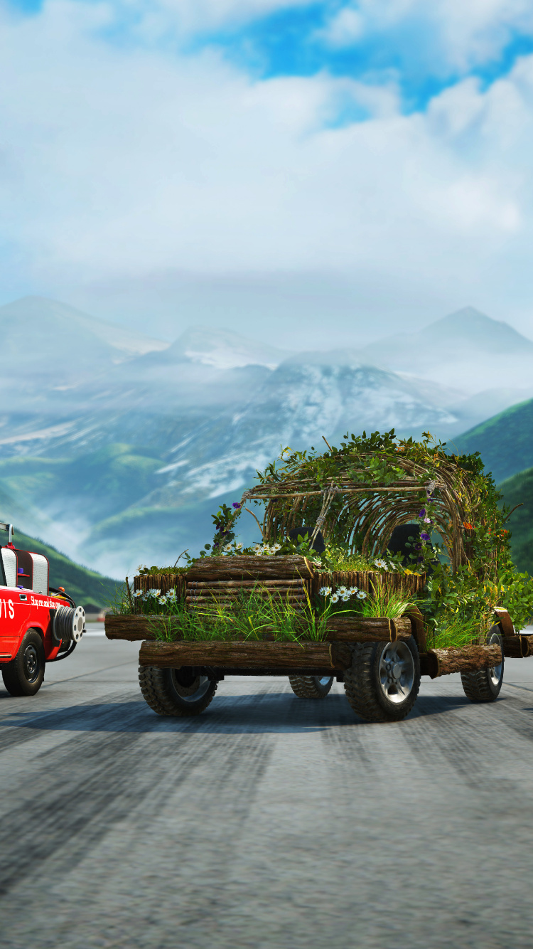Camion Rouge et Blanc Sur Route Près de la Montagne Verte Pendant la Journée. Wallpaper in 750x1334 Resolution