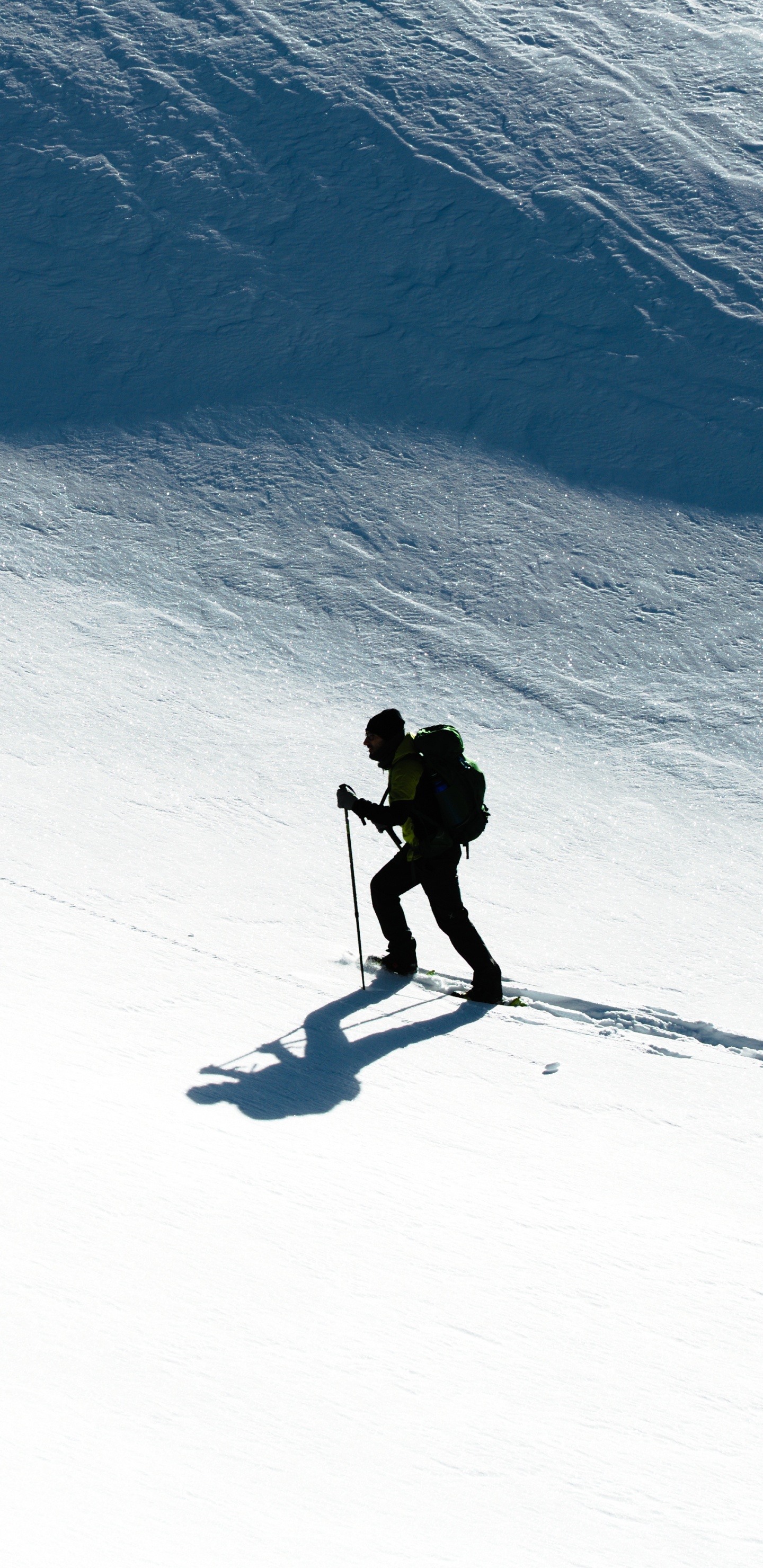 Man in Black Jacket and Pants Riding on Snowboard During Daytime. Wallpaper in 1440x2960 Resolution