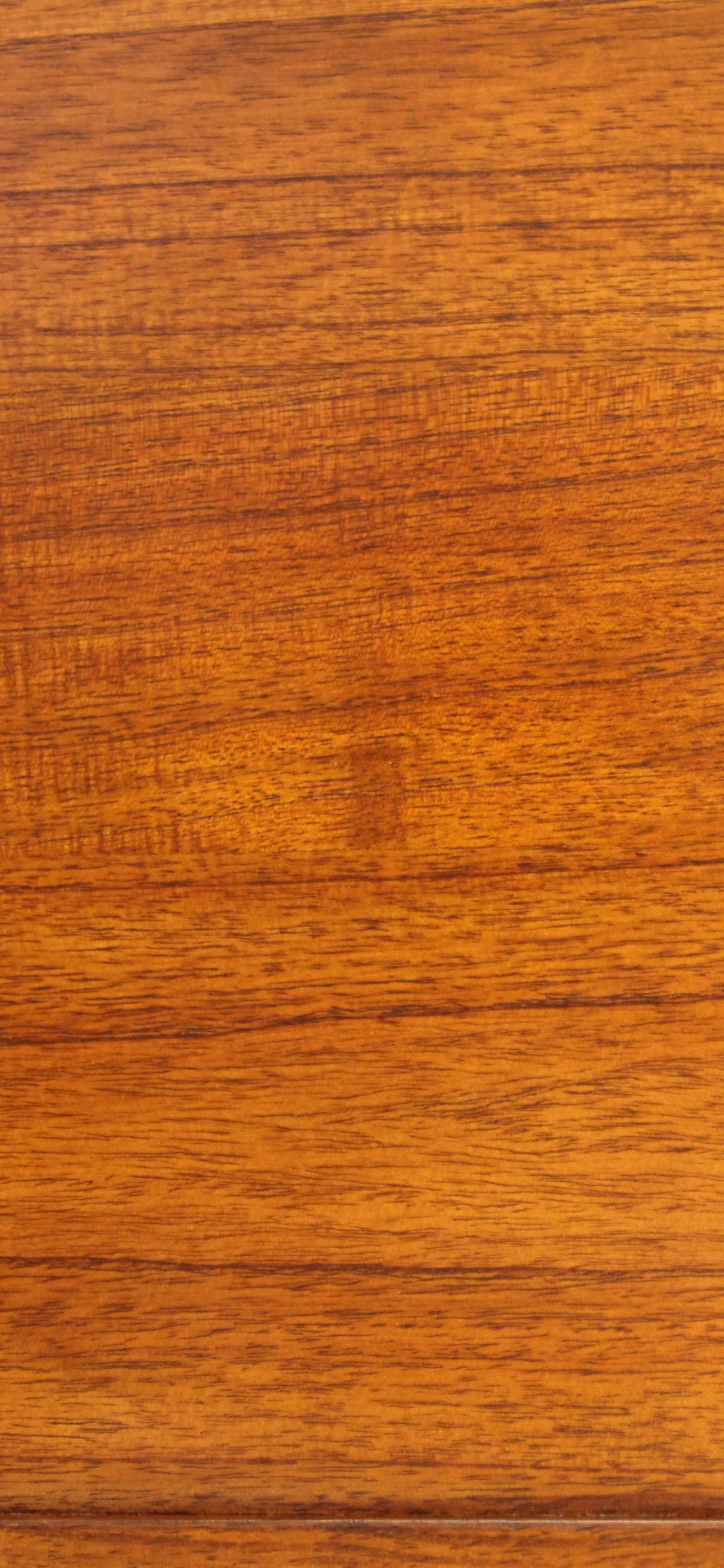 Brown Wooden Table With White Paper. Wallpaper in 1125x2436 Resolution