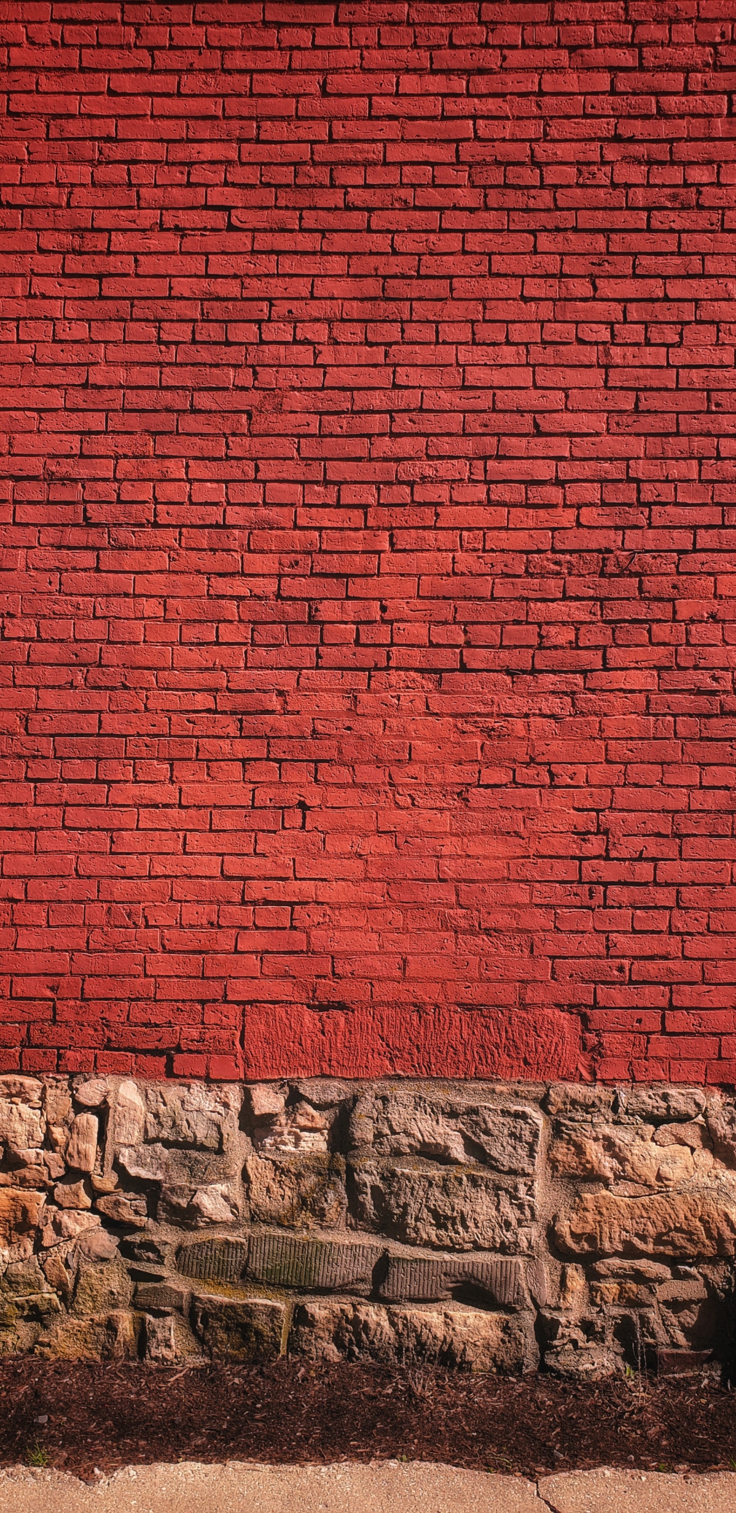 Red Brick Wall With Gray Concrete Blocks. Wallpaper in 1440x2960 Resolution