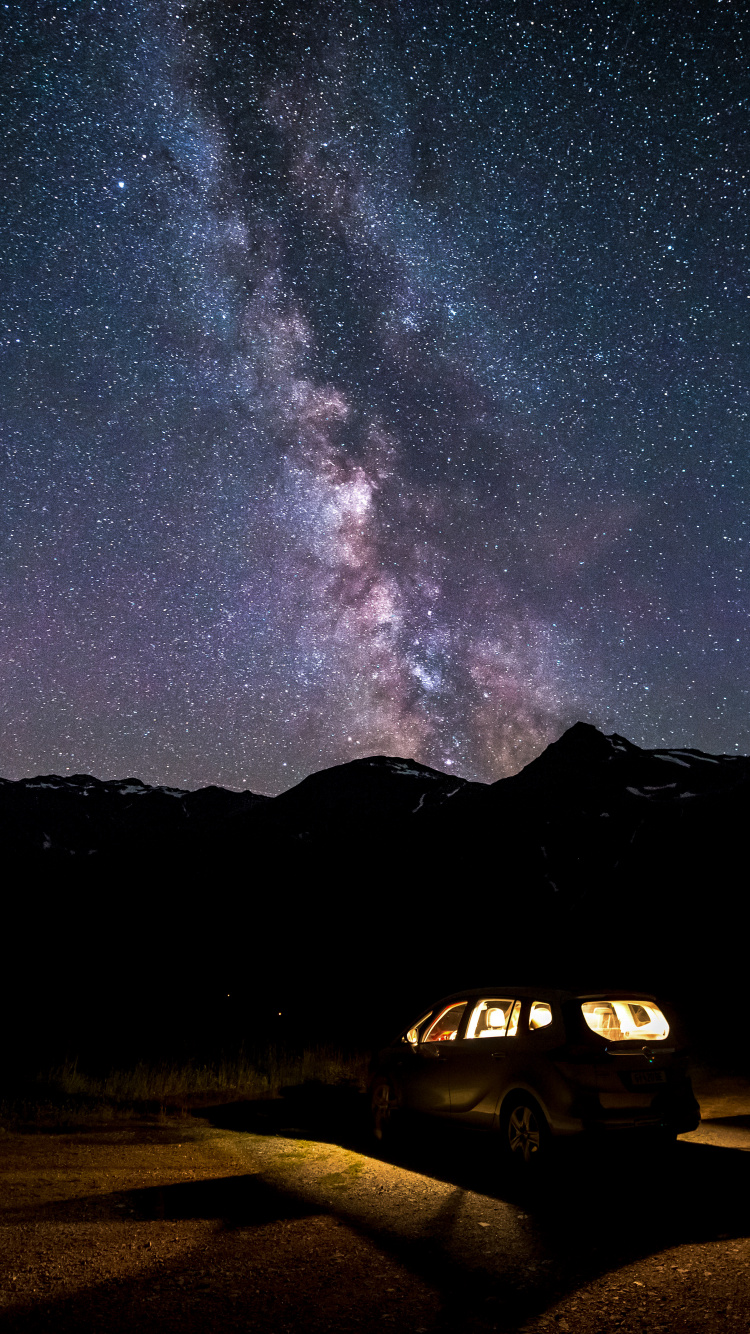 White Suv on Road During Night Time. Wallpaper in 750x1334 Resolution
