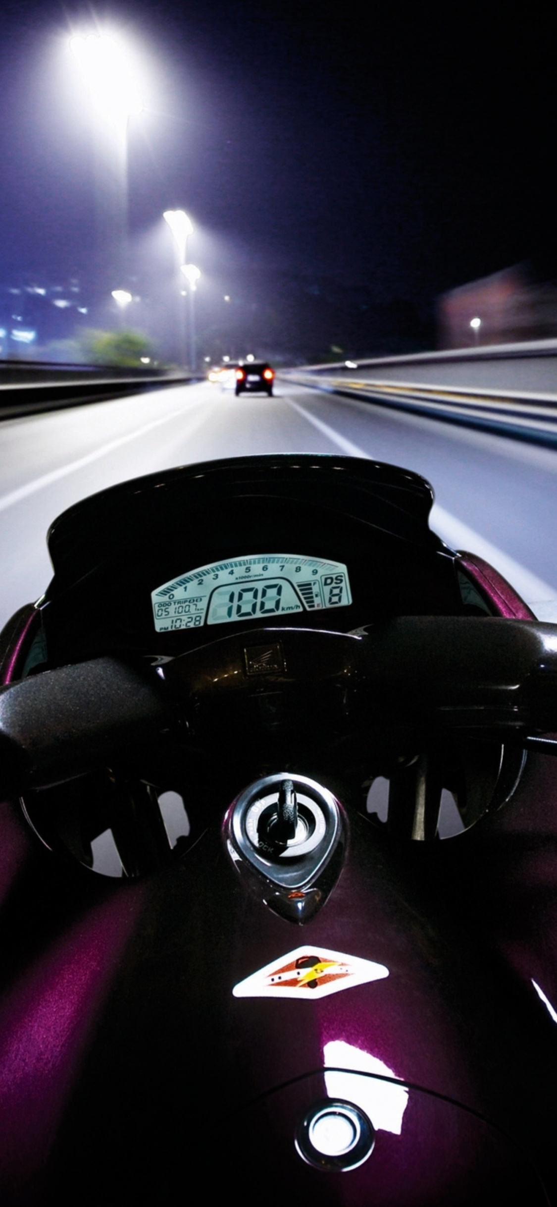 Black and Silver Car Steering Wheel. Wallpaper in 1125x2436 Resolution