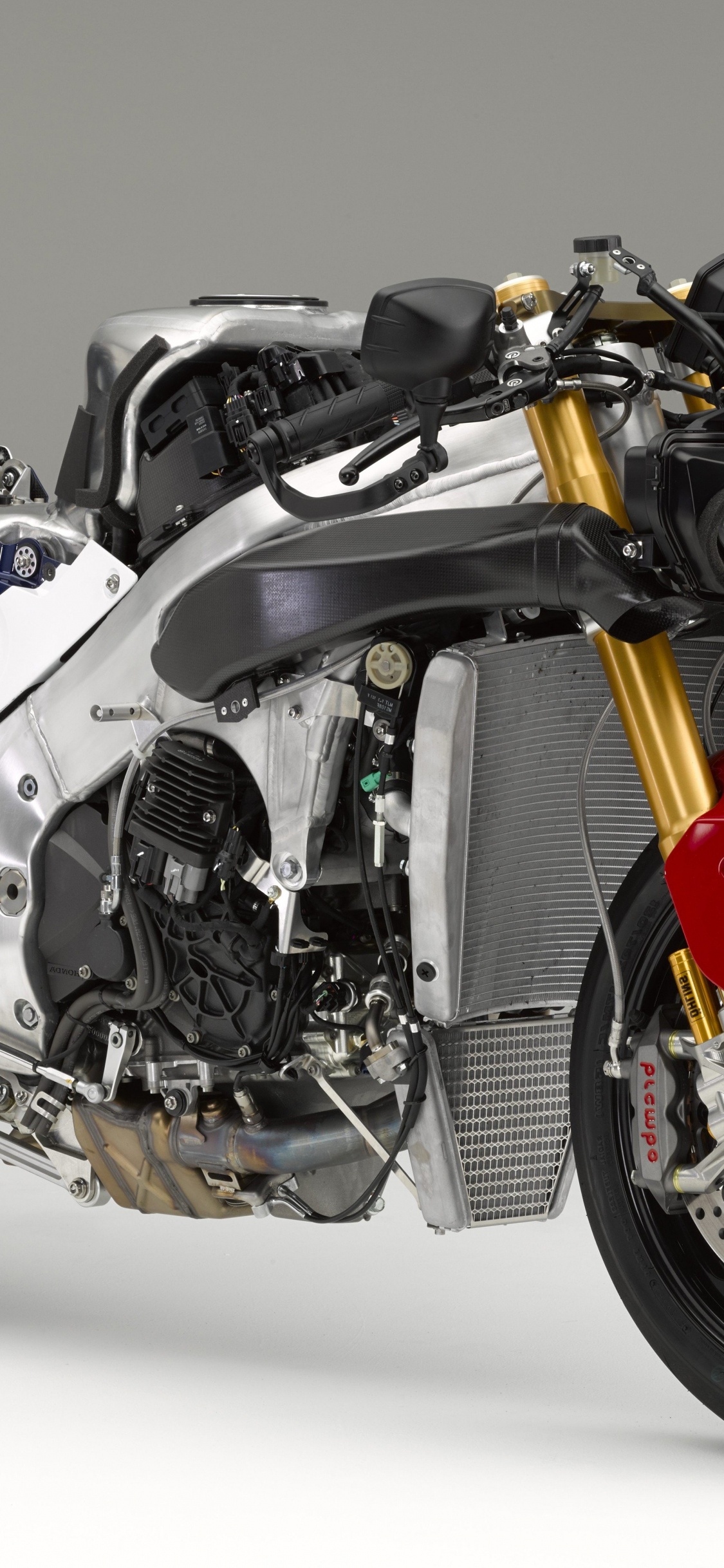 Red and Black Sports Bike. Wallpaper in 1125x2436 Resolution