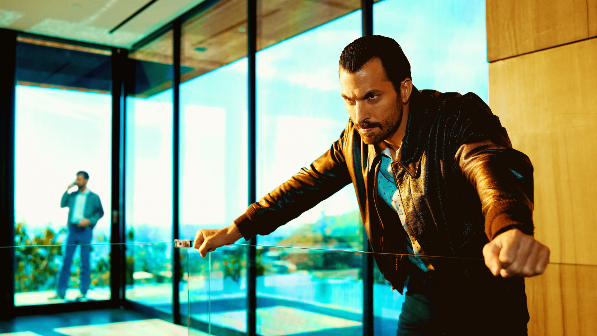 Man in Black Leather Jacket Standing Beside Glass Window. Wallpaper in 1920x1080 Resolution