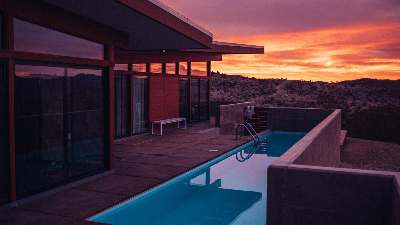 Swimming Pool Near Brown Wooden House During Sunset. Wallpaper in 1366x768 Resolution