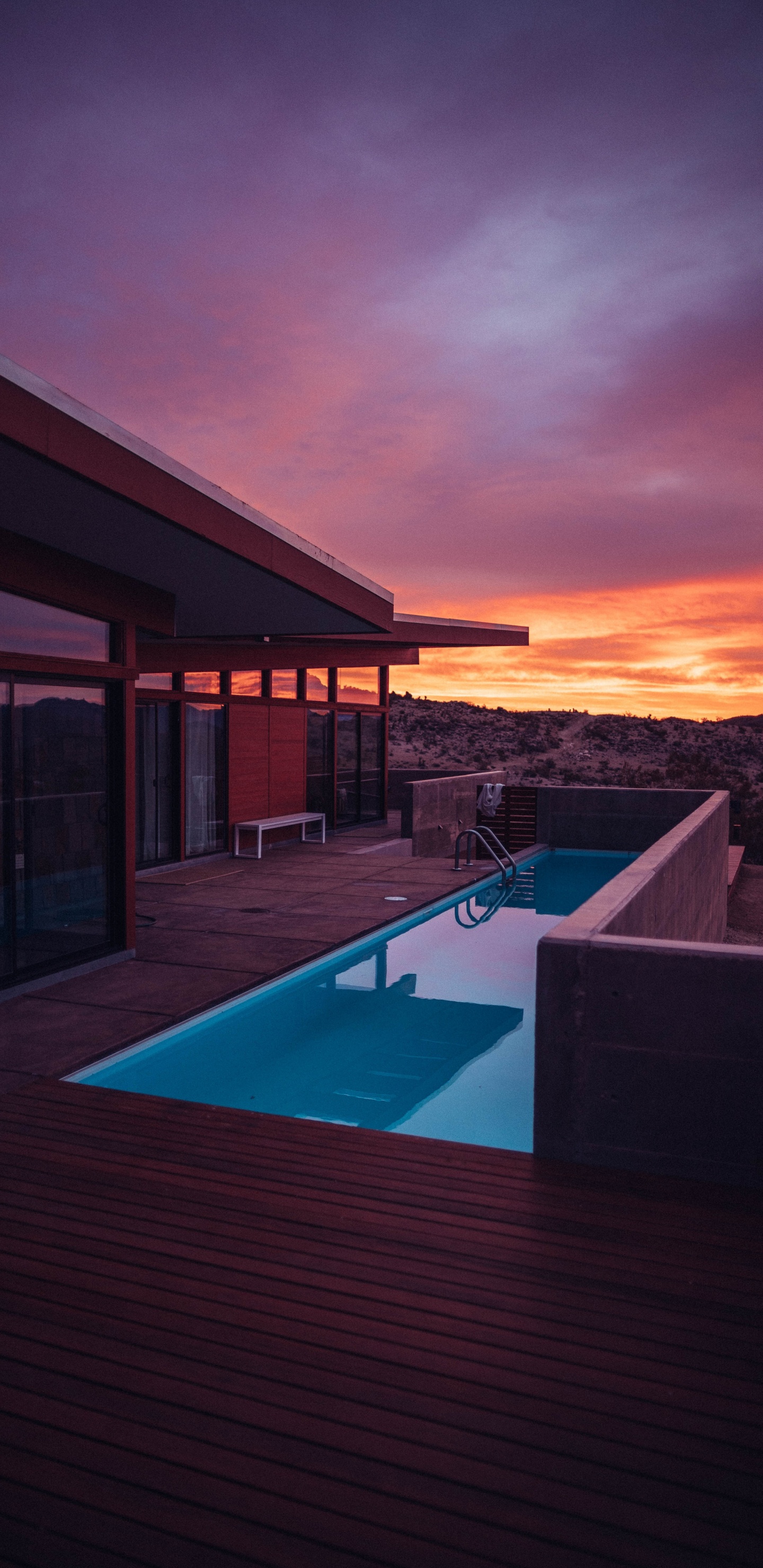 Swimming Pool Near Brown Wooden House During Sunset. Wallpaper in 1440x2960 Resolution
