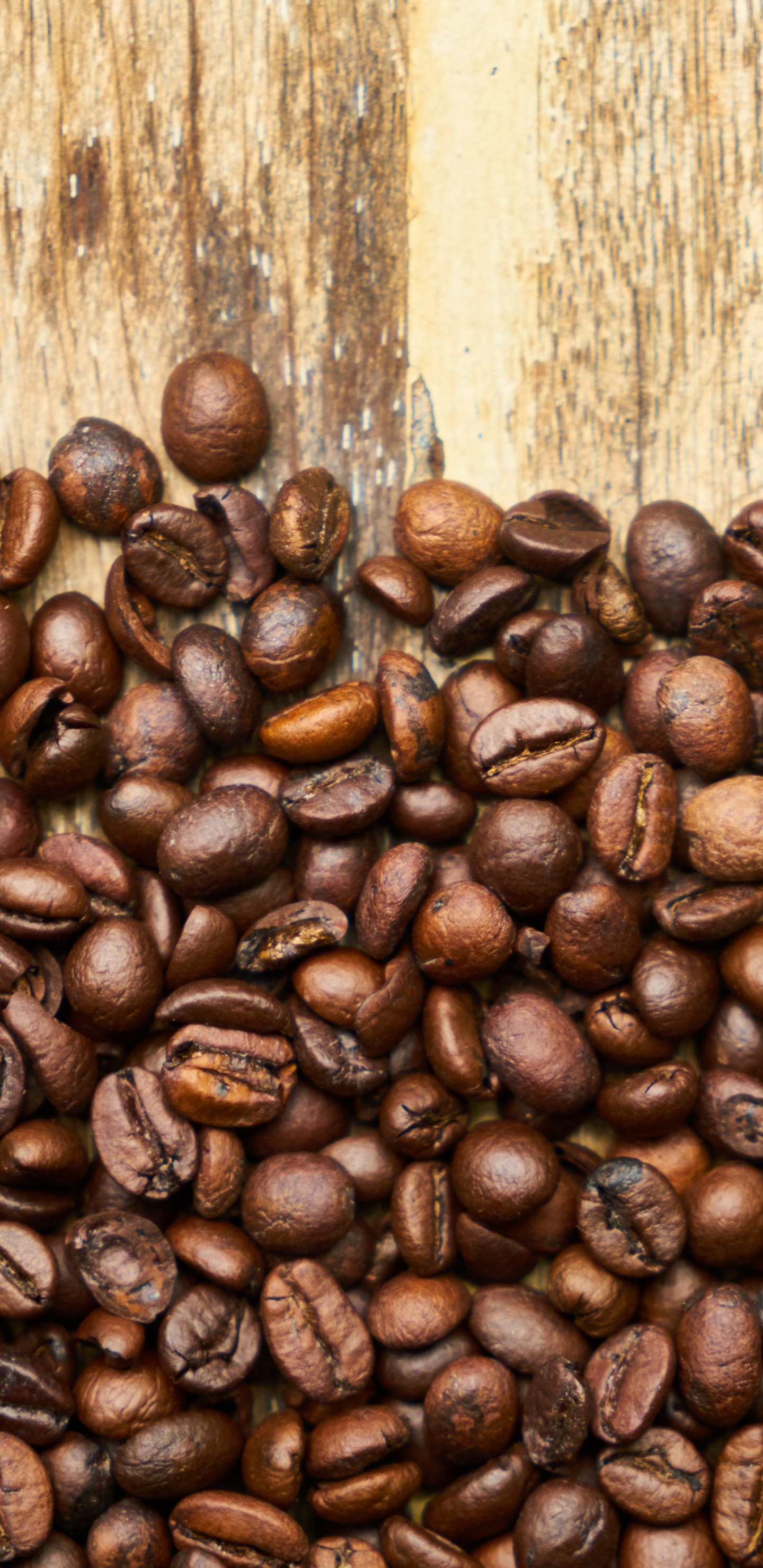 Coffee Beans on Brown Wooden Table. Wallpaper in 1440x2960 Resolution
