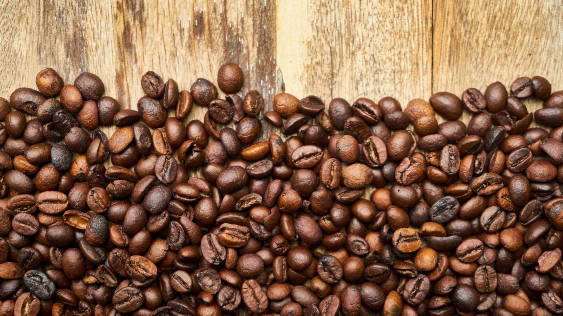Coffee Beans on Brown Wooden Table. Wallpaper in 1920x1080 Resolution