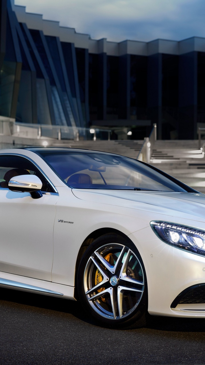 White Mercedes Benz Coupe Parked Near Building During Daytime. Wallpaper in 720x1280 Resolution