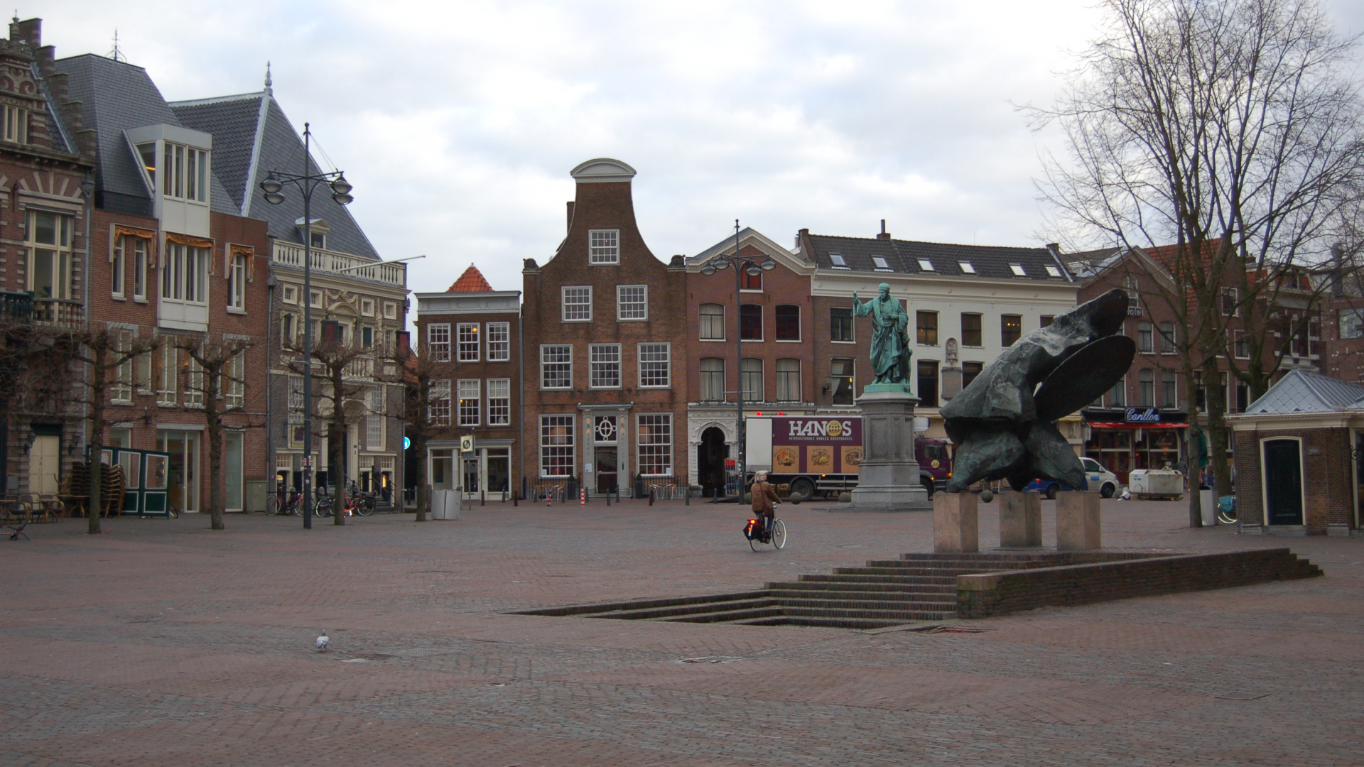 Brown Concrete Building Near Bare Trees During Daytime. Wallpaper in 1920x1080 Resolution