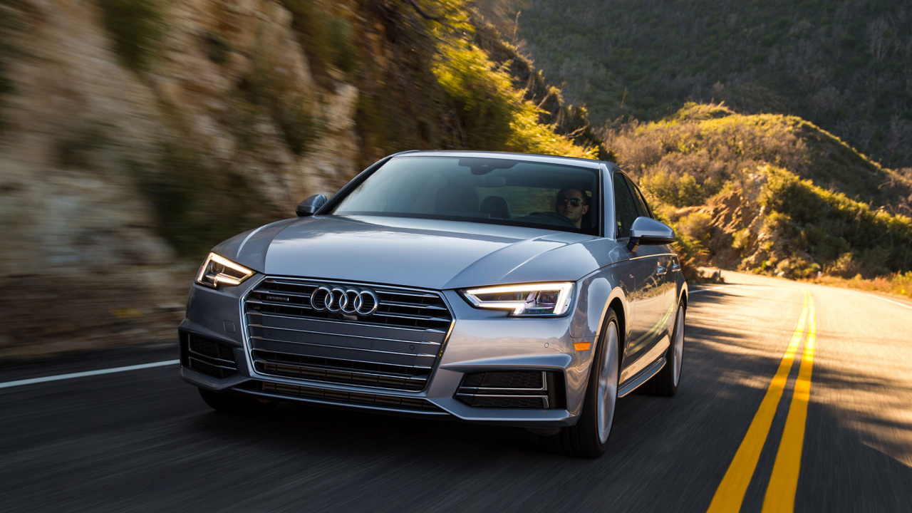 Audi Noir a 4 Sur Route Pendant la Journée. Wallpaper in 1280x720 Resolution