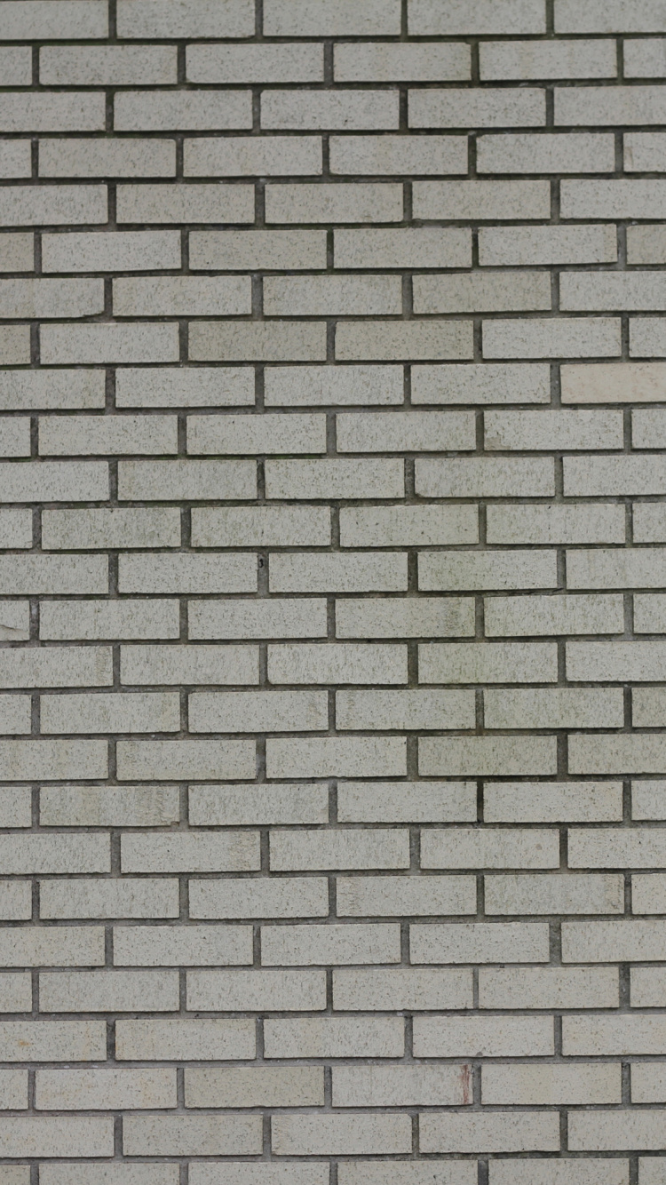 Pared de Ladrillo Marrón y Negro. Wallpaper in 750x1334 Resolution