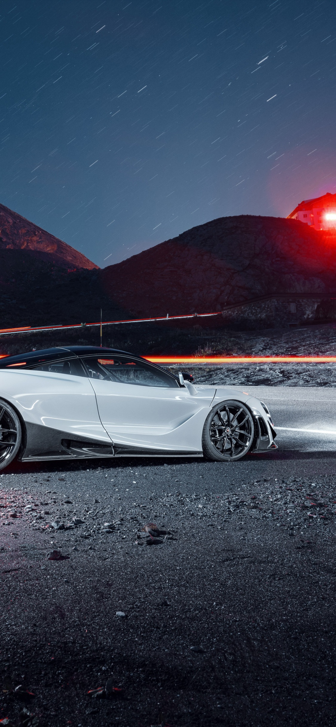 White Coupe on Road During Night Time. Wallpaper in 1125x2436 Resolution