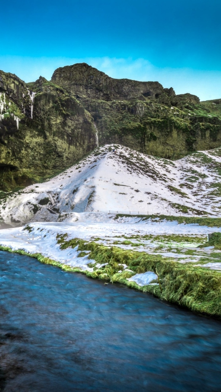 Waterfalls Near Green and Gray Mountain Under Blue Sky During Daytime. Wallpaper in 720x1280 Resolution