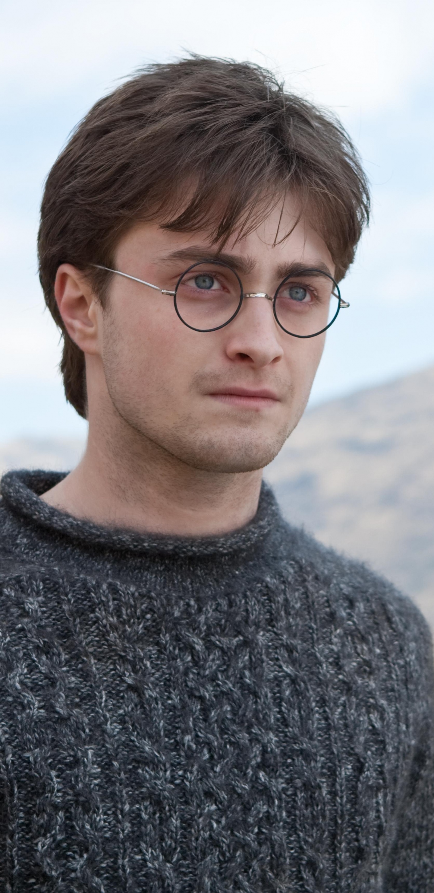 Man in Gray Sweater Wearing Black Framed Eyeglasses. Wallpaper in 1440x2960 Resolution