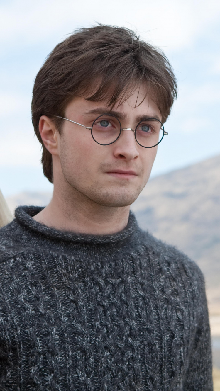 Man in Gray Sweater Wearing Black Framed Eyeglasses. Wallpaper in 750x1334 Resolution