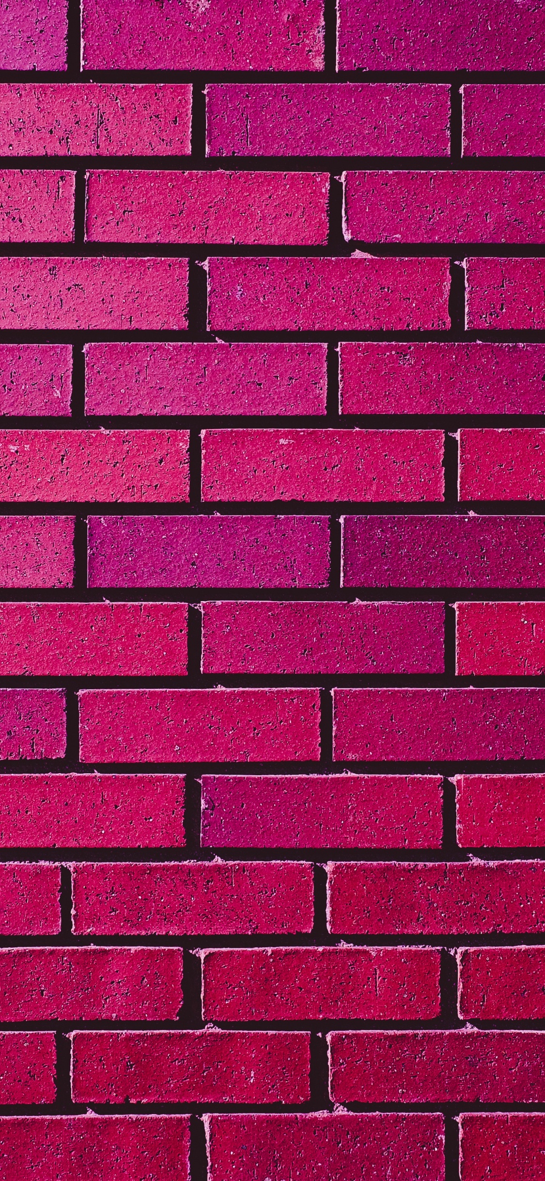 Red and Black Brick Wall. Wallpaper in 1125x2436 Resolution