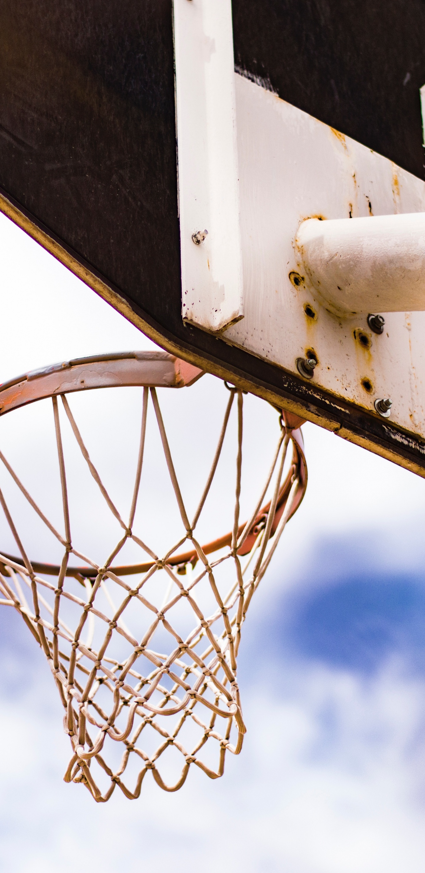 White Basketball Hoop Under Blue Sky During Daytime. Wallpaper in 1440x2960 Resolution
