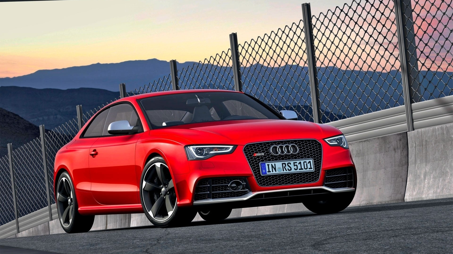 Red Audi a 4 Coupe Parked Near Gray Metal Fence During Daytime. Wallpaper in 1920x1080 Resolution