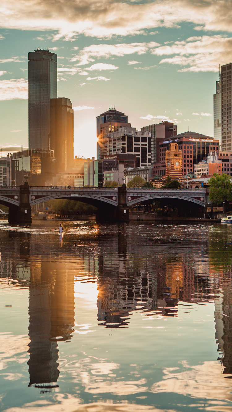 Body of Water Near City Buildings During Daytime. Wallpaper in 750x1334 Resolution