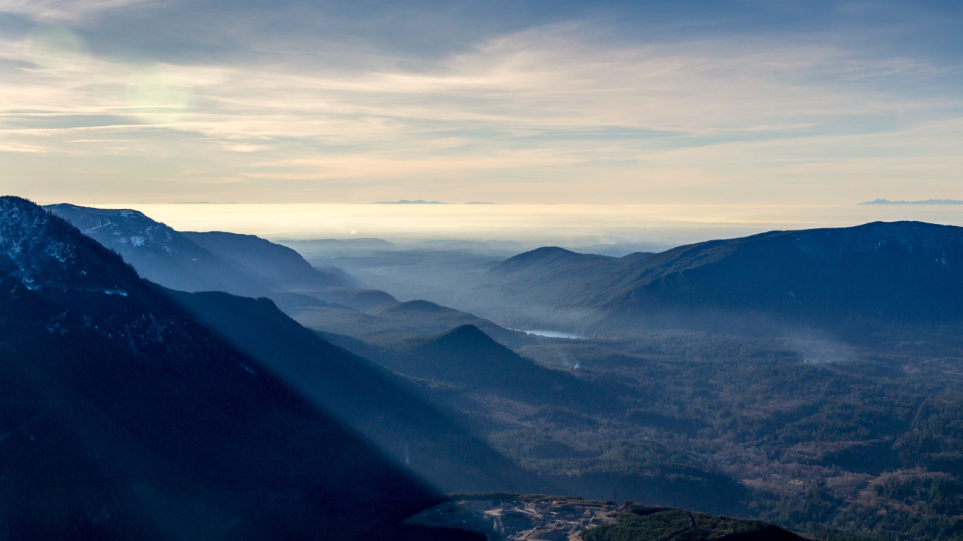 Green Mountains Under White Clouds During Daytime. Wallpaper in 1366x768 Resolution