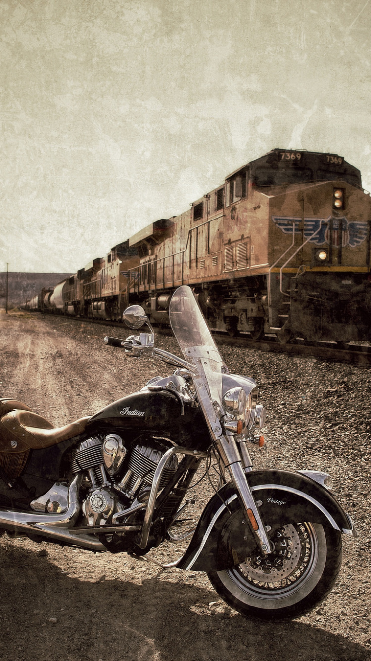 Black and Silver Cruiser Motorcycle Parked Beside Brown Wall. Wallpaper in 750x1334 Resolution