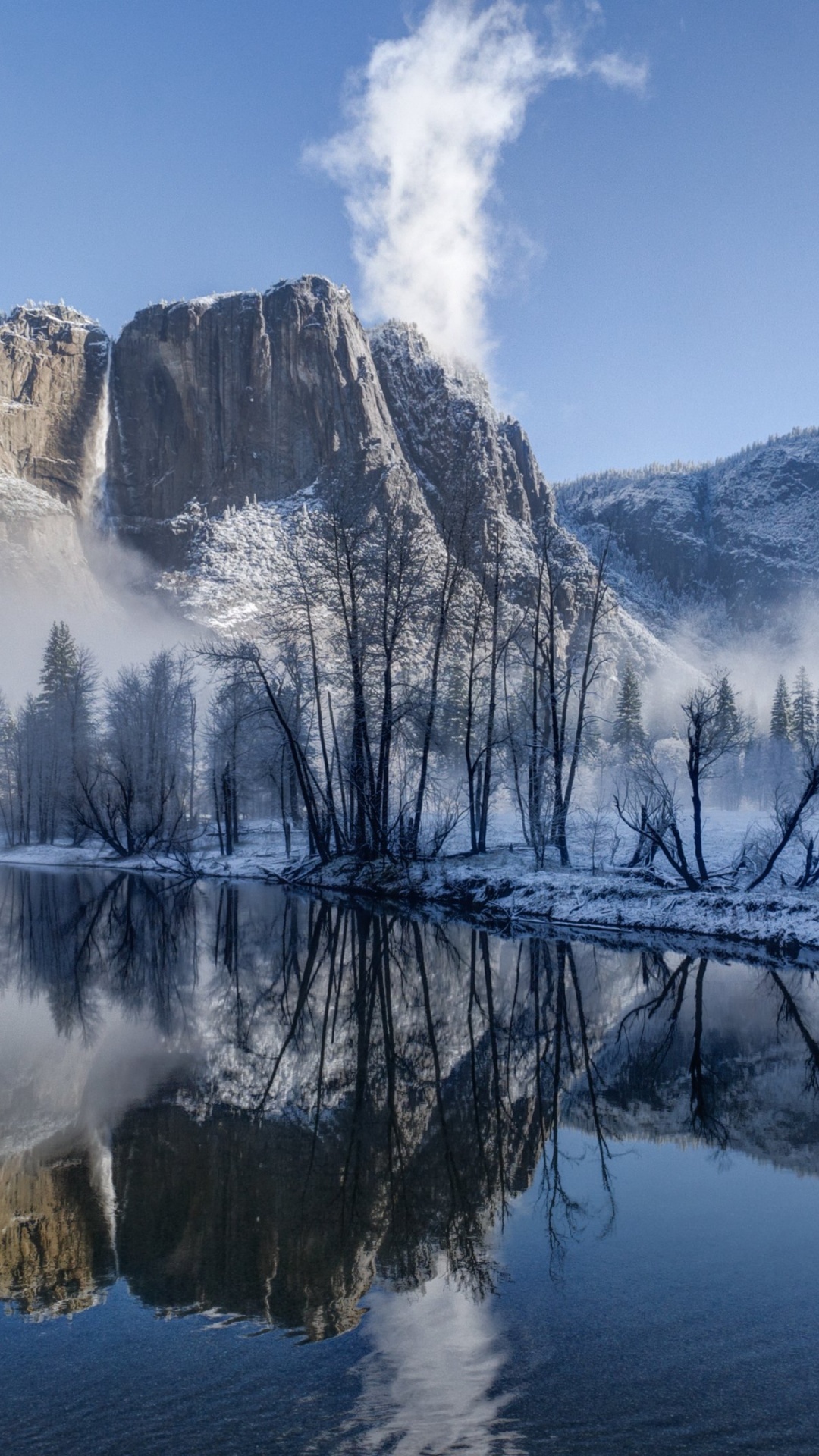 Snow Covered Mountain Near Body of Water During Daytime. Wallpaper in 1080x1920 Resolution